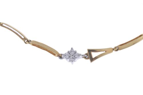 Pulsera en oro bicolor y diamantes.