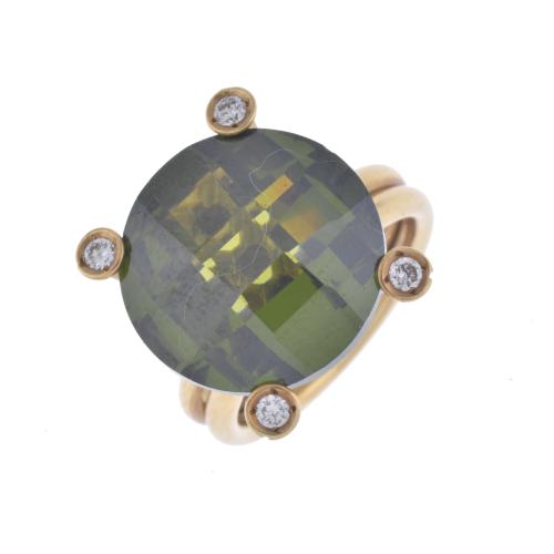 Ring with green topaz and zircons.