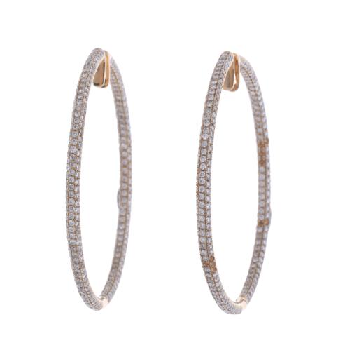 Hoop earrings with diamonds.