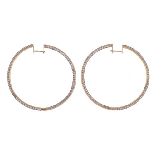 Hoop earrings with diamonds.