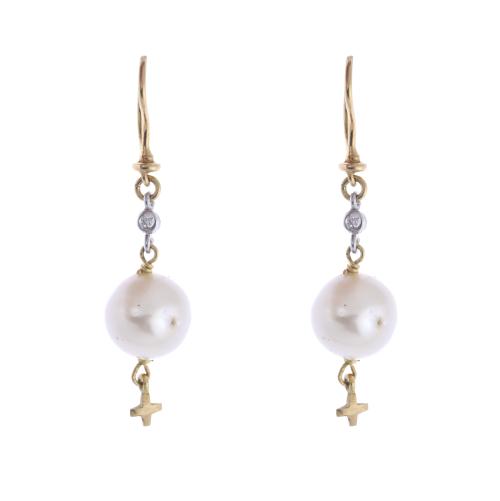 Long earrings with pearls and diamonds.