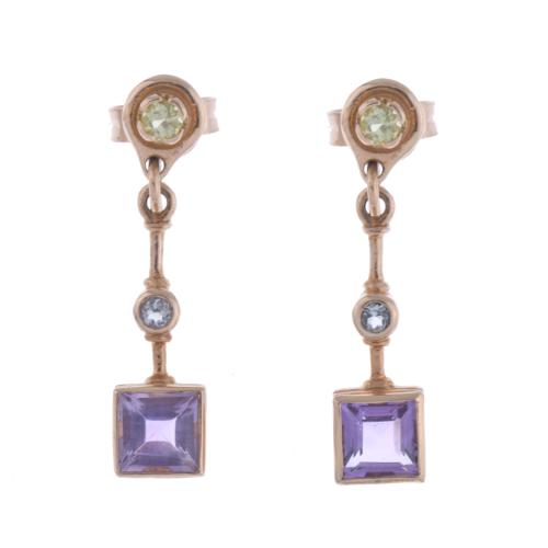 Long earrings with amethysts and diamonds.