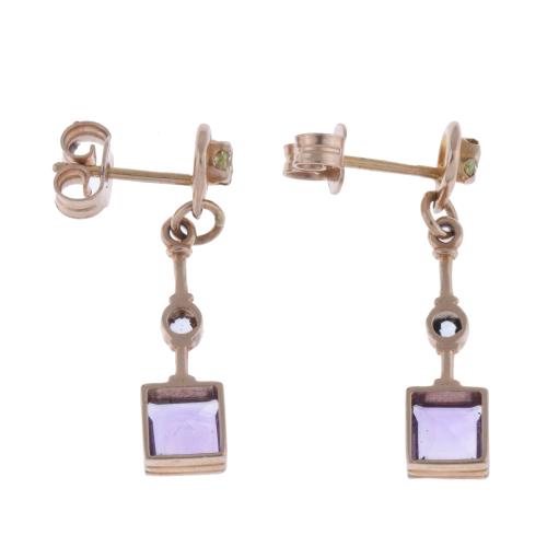 Long earrings with amethysts and diamonds.