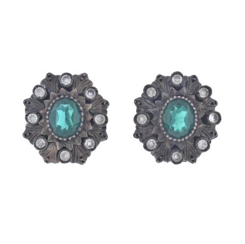 'Noucentista' earrings with emeralds and diamonds.