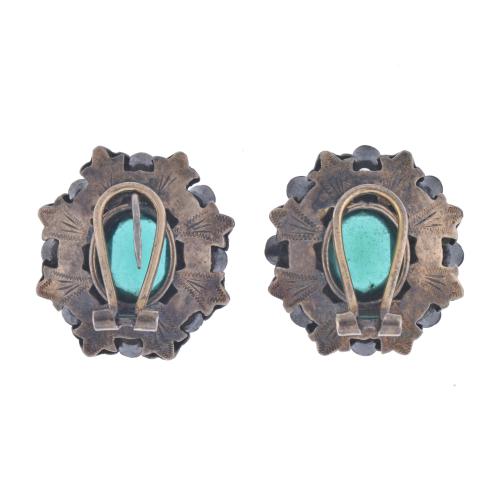 &#39;Noucentista&#39; earrings with emeralds and diamonds.