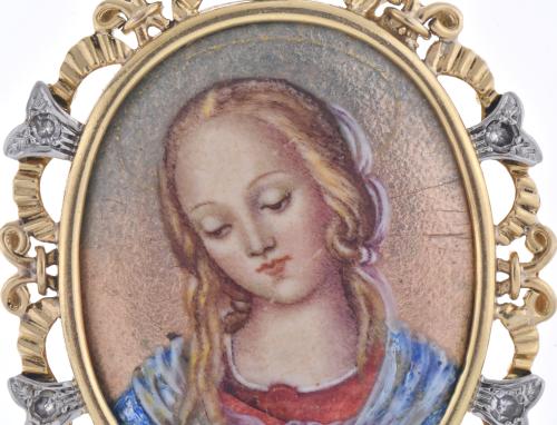 Colgante medalla con imágen de la virgen con diamantes.