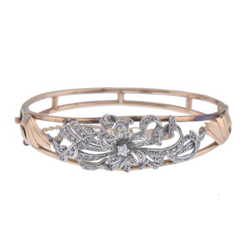 Belle Epoque bracelet with floral motifs and diamonds.