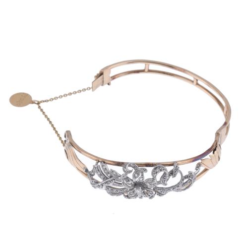 Pulsera belle époque con motivos florales y diamantes.