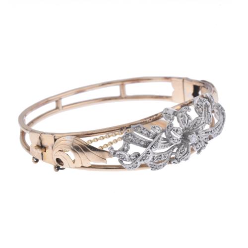 Pulsera belle époque con motivos florales y diamantes.
