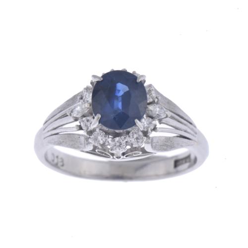 Art Deco style ring with sapphire and diamonds rosette.