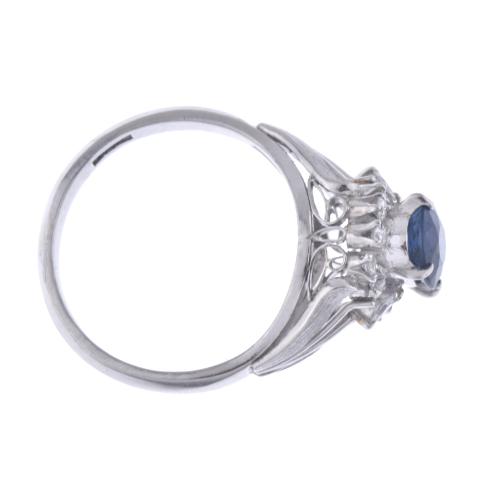 Art Deco style ring with sapphire and diamonds rosette.
