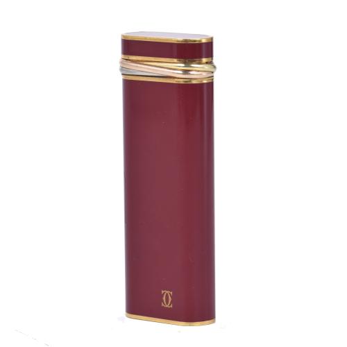 CARTIER. Encendedor modelo "Trinity". 