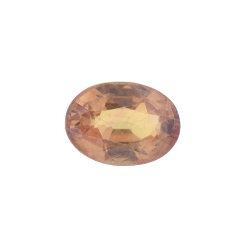 Unmounted orange sapphire.