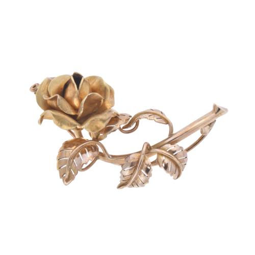 Broche en forma de rosa.