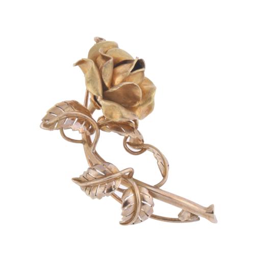Rose-shaped brooch.