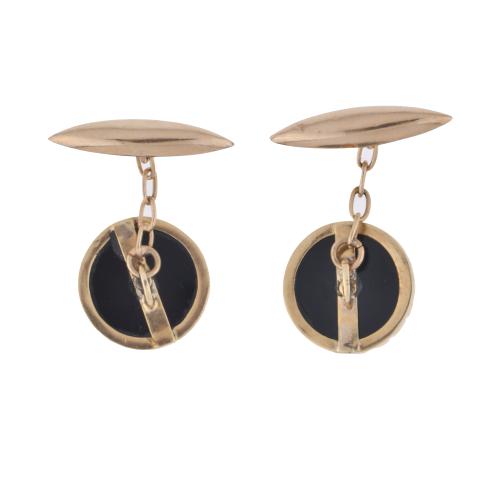 Gemelos en oro, ónix y perlas. 
