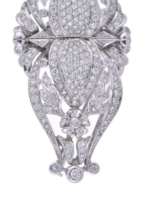 Broche doble transformable, con motivos florales y diamante