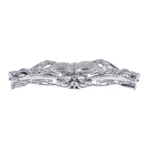 Broche doble transformable, con motivos florales y diamante