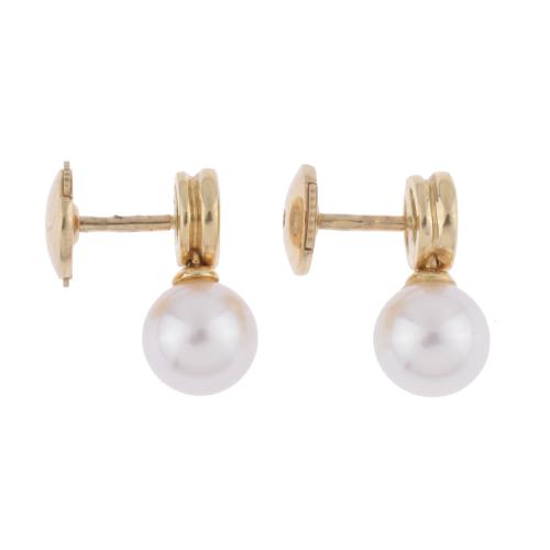 Pendientes tu y yo con diamante y perla.
