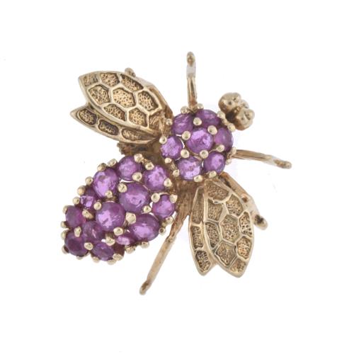 Bee-shaped brooch.
