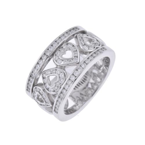Heart-shaped wide ring with diamonds.