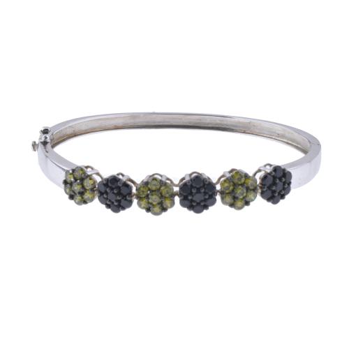 Semi-rigid floral bracelet with olivines and zircons.