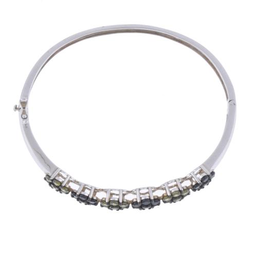 Semi-rigid floral bracelet with olivines and zircons.