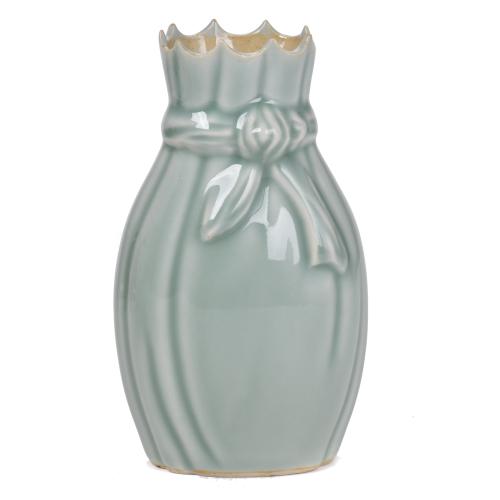 CHINESE SCHOOL, LATE QING DYNASTY, 20TH CENTURY. Celadon porcelain vase.