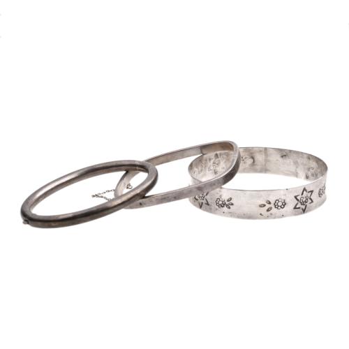 Set of three silver bracelets.
