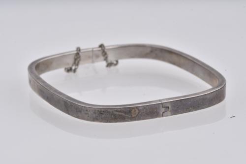 Set of three silver bracelets.