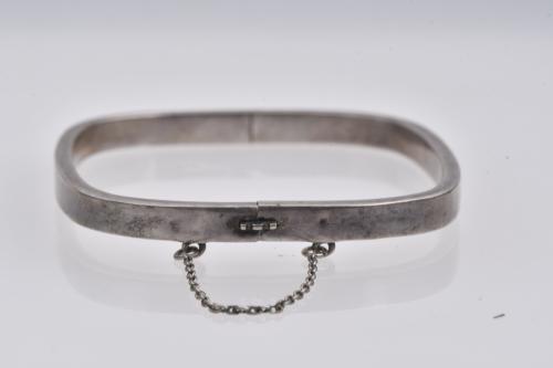 Set of three silver bracelets.