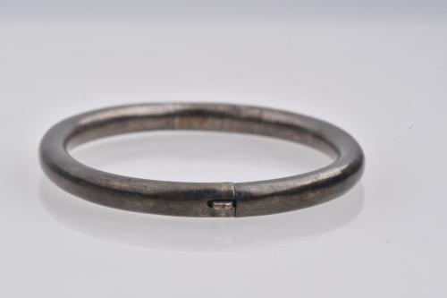 Set of three silver bracelets.