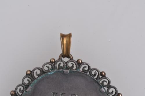 Colgante con imágen de la virgen de la Mercè.