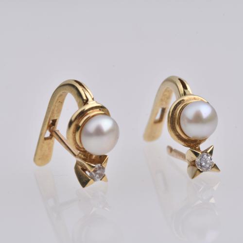 You and me earrings with pearl and zircon.