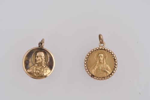 Pair of devotional pendants.