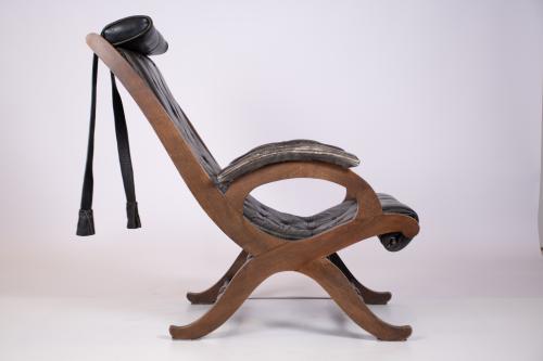 VALENTÍ. Leather armchair with ottoman, mid 20th century.
