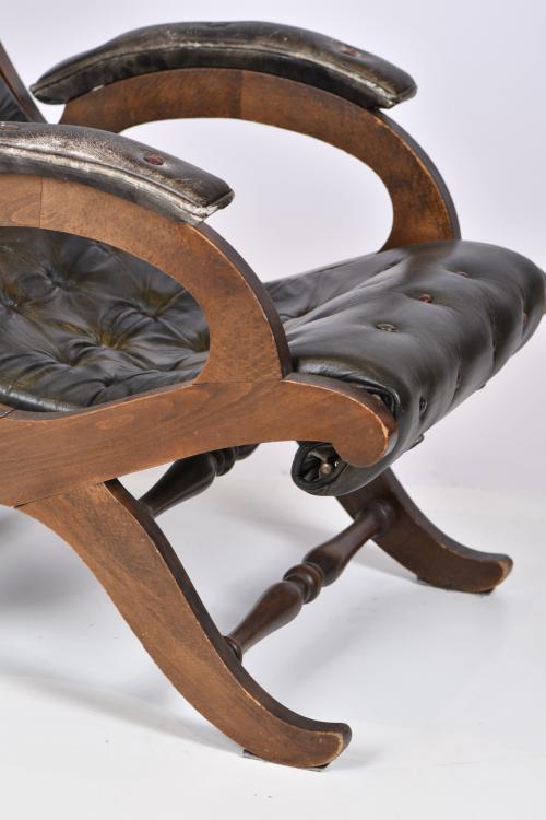 VALENTÍ. Leather armchair with ottoman, mid 20th century.