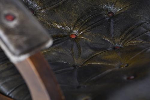 VALENTÍ. Leather armchair with ottoman, mid 20th century.