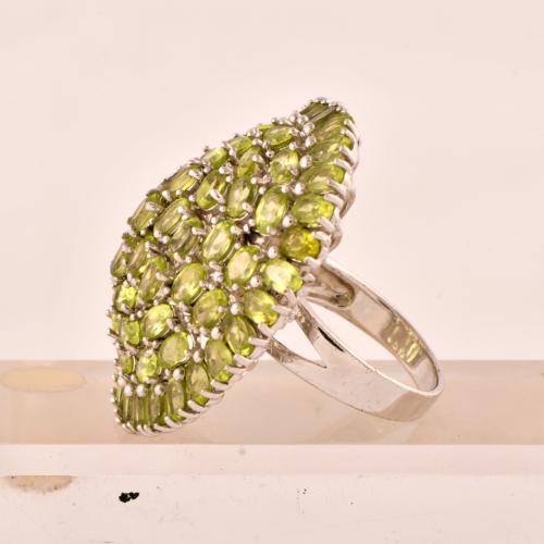 Ring with a large olivine rosette