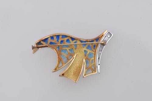 Brooch with glazed enamel and diamonds.