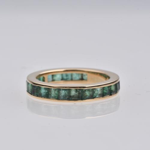 Emeralds wedding ring.