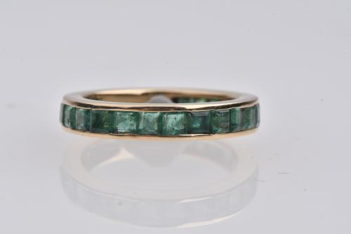Emeralds wedding ring.