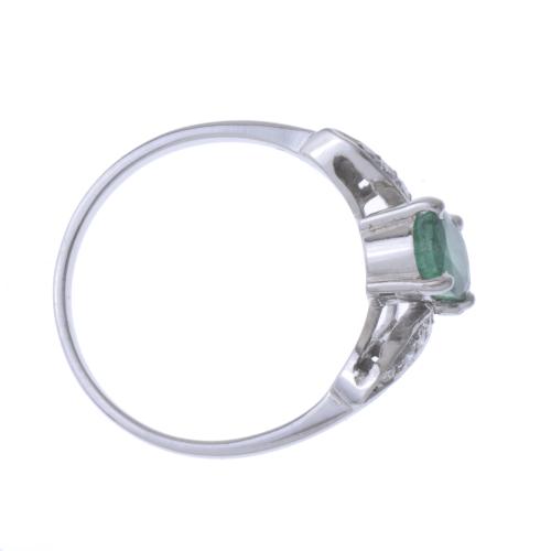 EMERALD AND DIAMONDS RING.