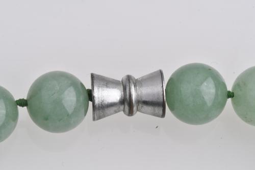 Jade bead necklace.
