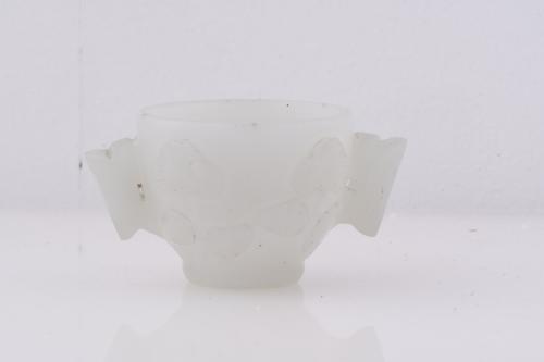 20TH CENTURY CHINESE SCHOOL. Set of four jade objects.