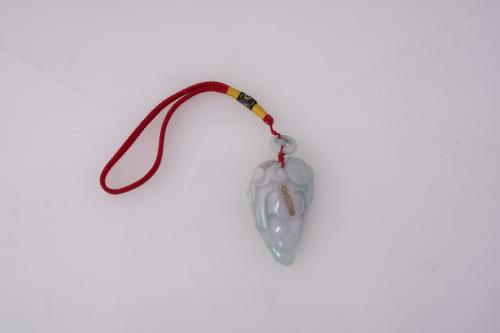 ESCUELA CHINA, SIGLO XX.  Colgante con la representación de