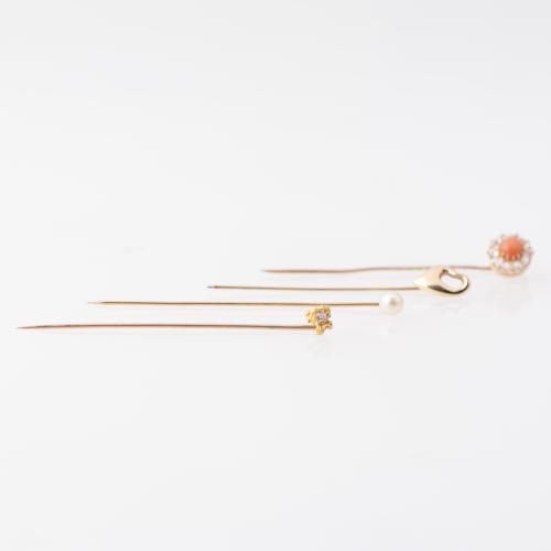 Set of four tie pins