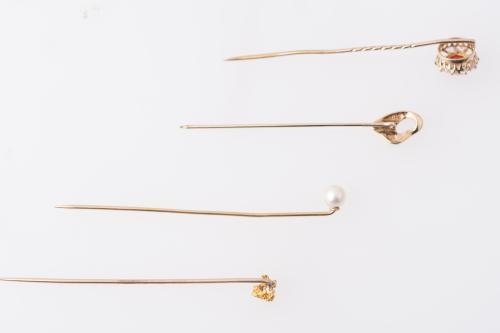 Set of four tie pins