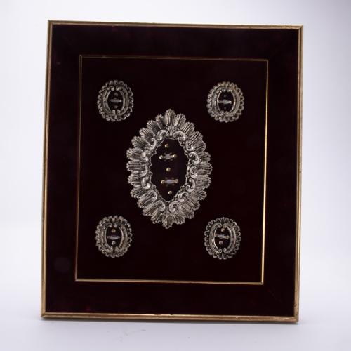 Panel with six relics, 20th century.