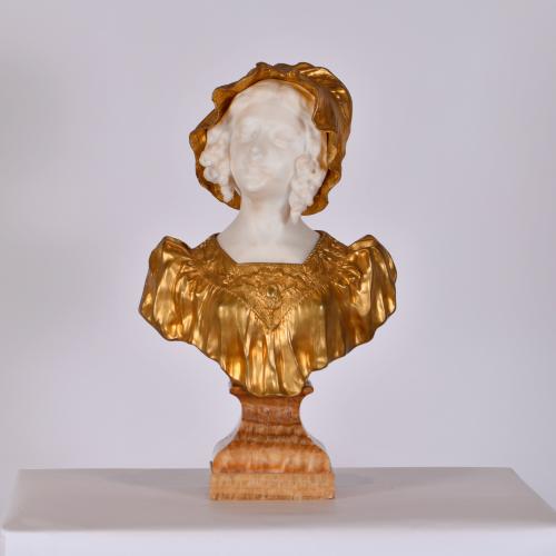 AFTER MODELS BY AFFORTUNATO GORY (1869 - 1925). Girl's bust.